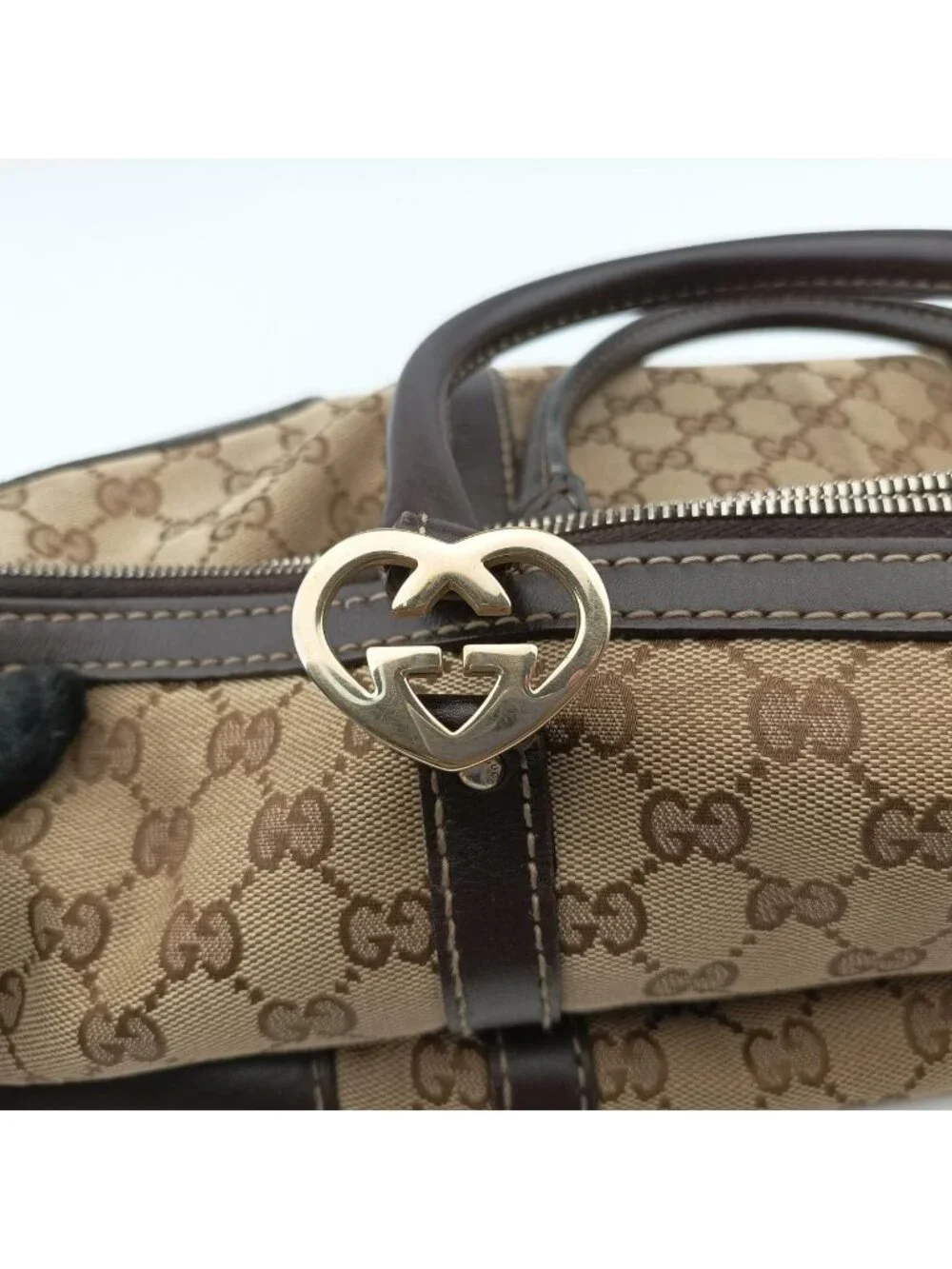 Gucci Brea Brown GG Canvas Leather Handbag